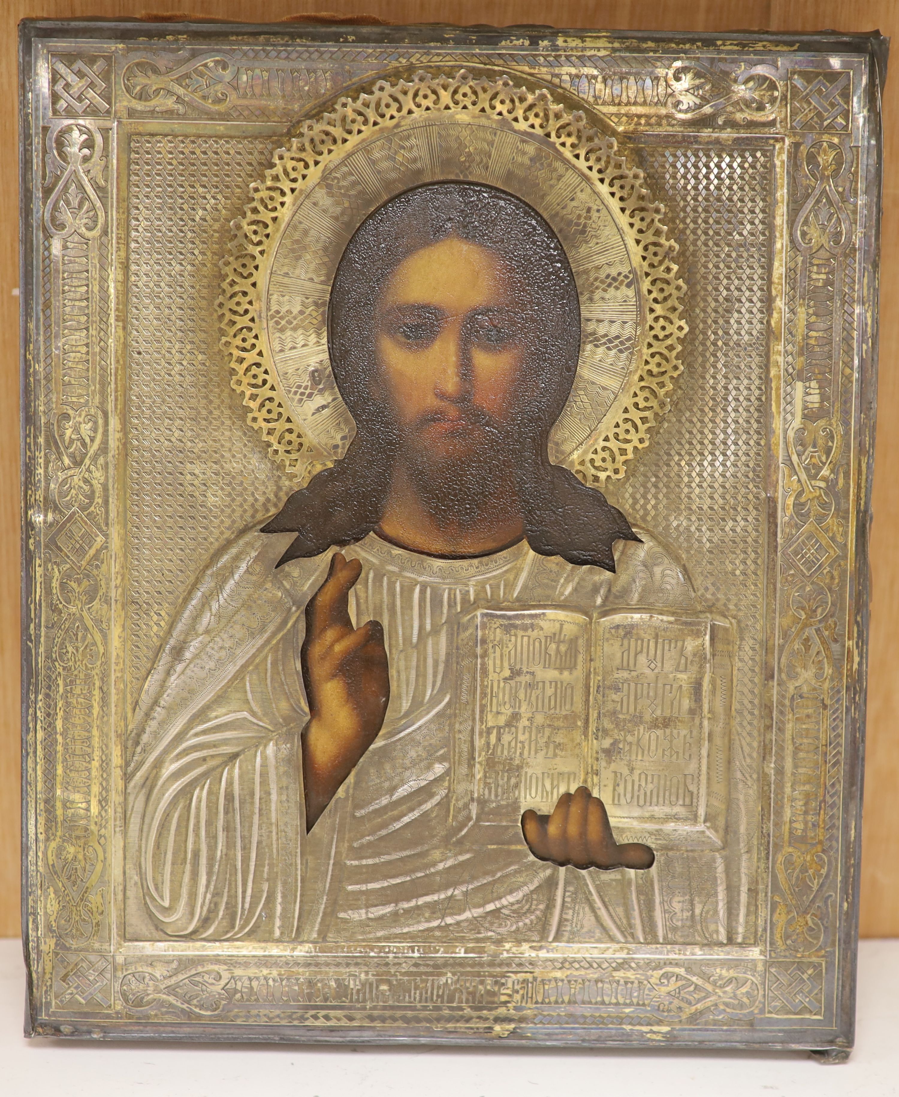 Late 19th Century Russian School, tempera on panel, Icon of Christ Pantocrator, with silver oklad, 27 x 22cm.